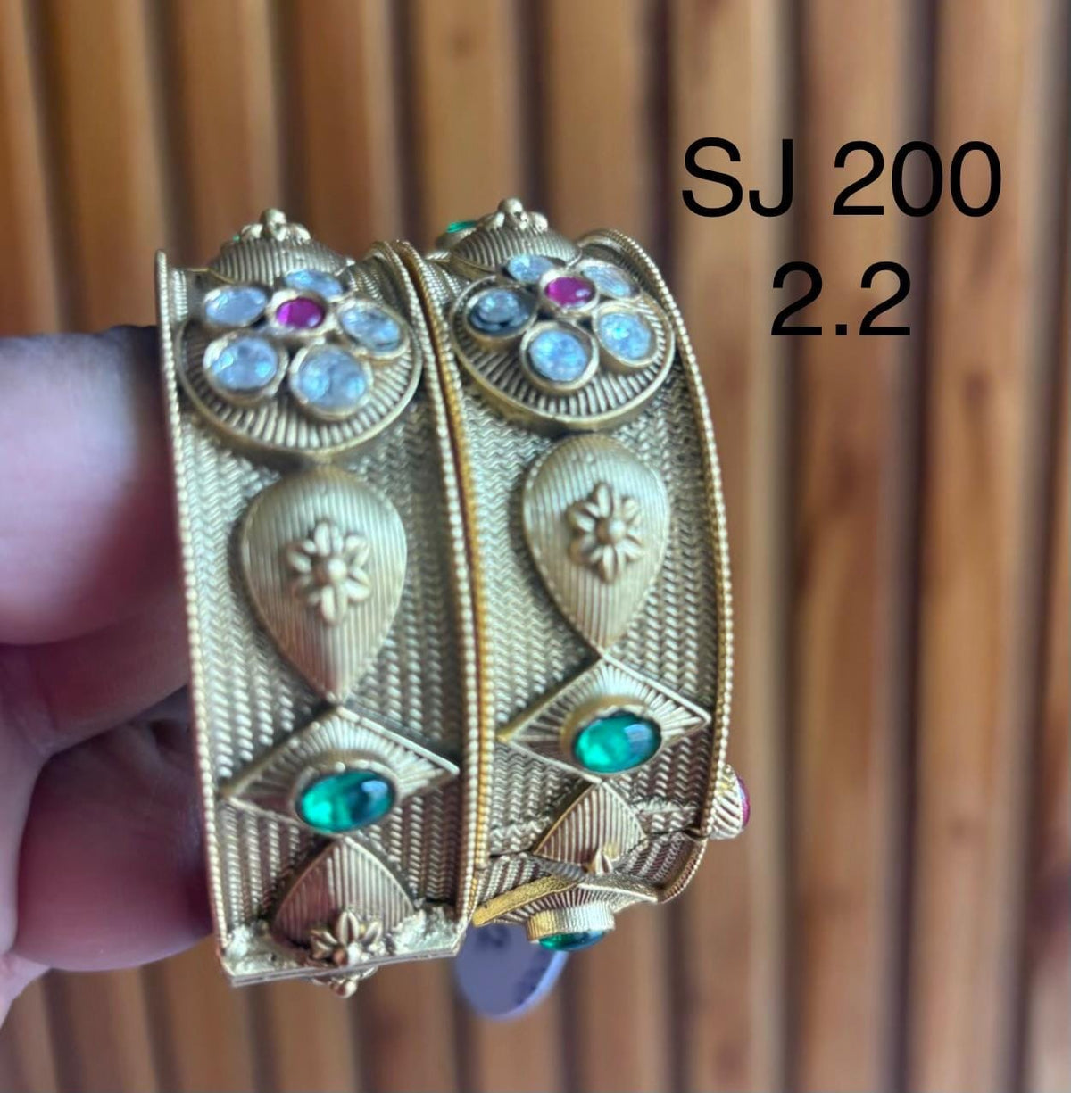 Kundan Two-Tone Leaf Medallion Bangle Set — original client product photograph