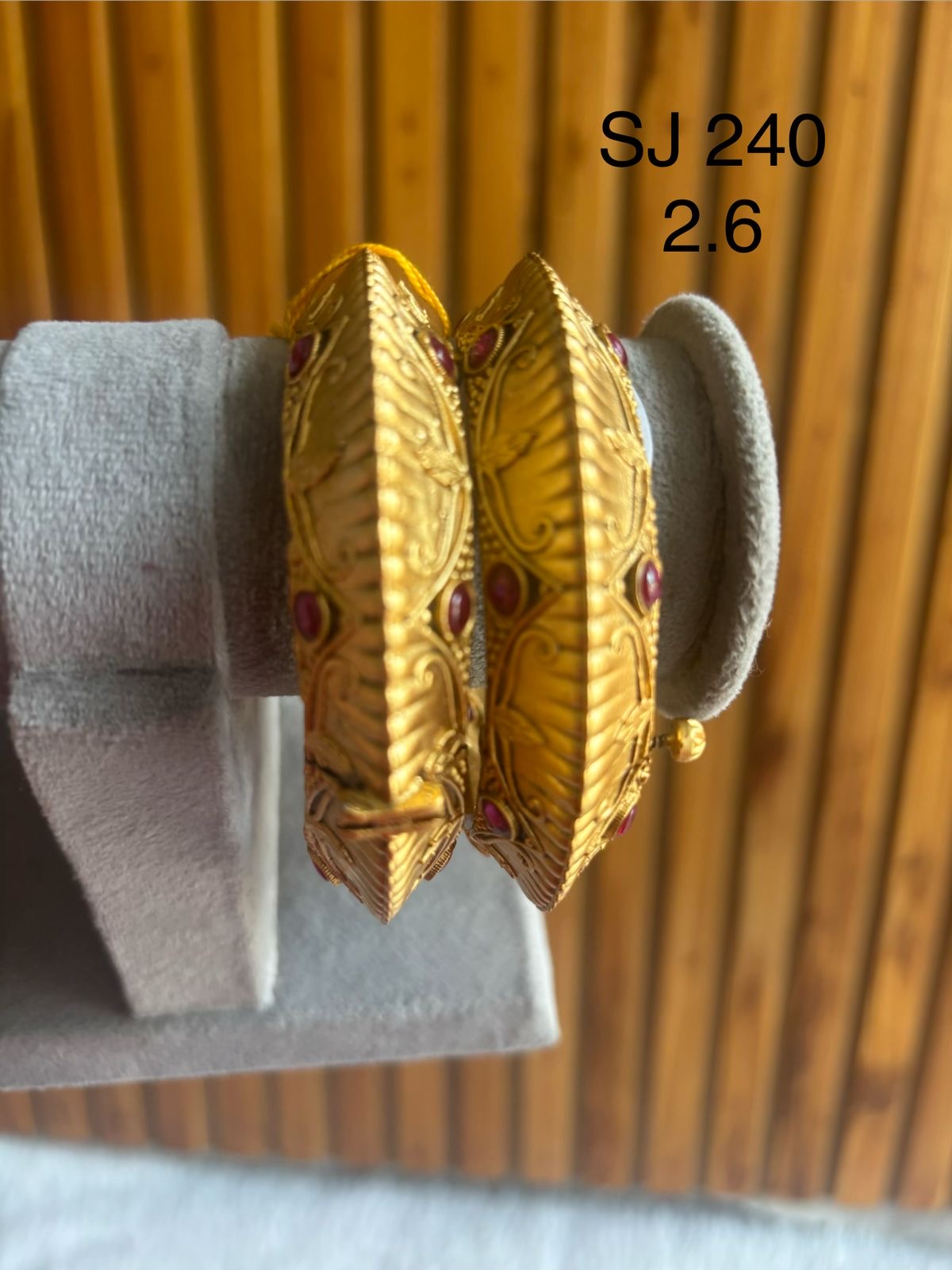 Kundan Sculpted Leaf Red Accent Bangle Set — original client product photograph