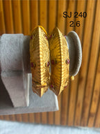 Kundan Sculpted Leaf Red Accent Bangle Set — original client product photograph