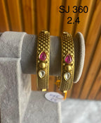 Antique Red Teardrop Bangles — original product photograph