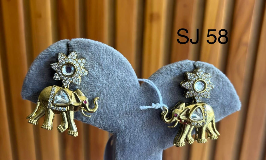 Fusion Elephant Motif Drop Earrings — original product photograph
