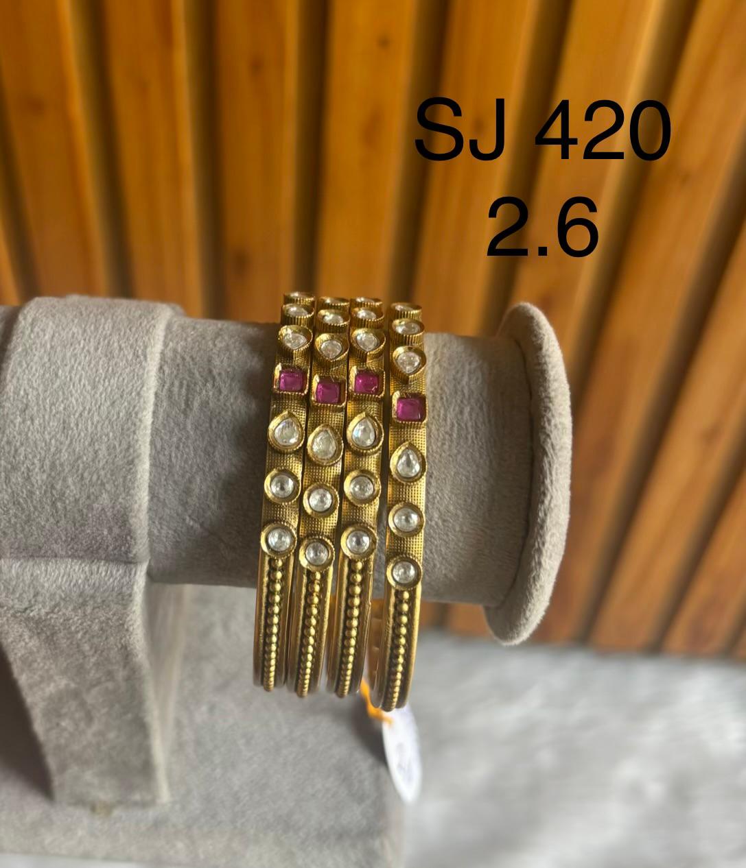 Antique Floral Stone Bangle Set — original product photograph