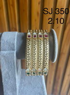 Antique Red Accent Filigree Bangles — original product photograph