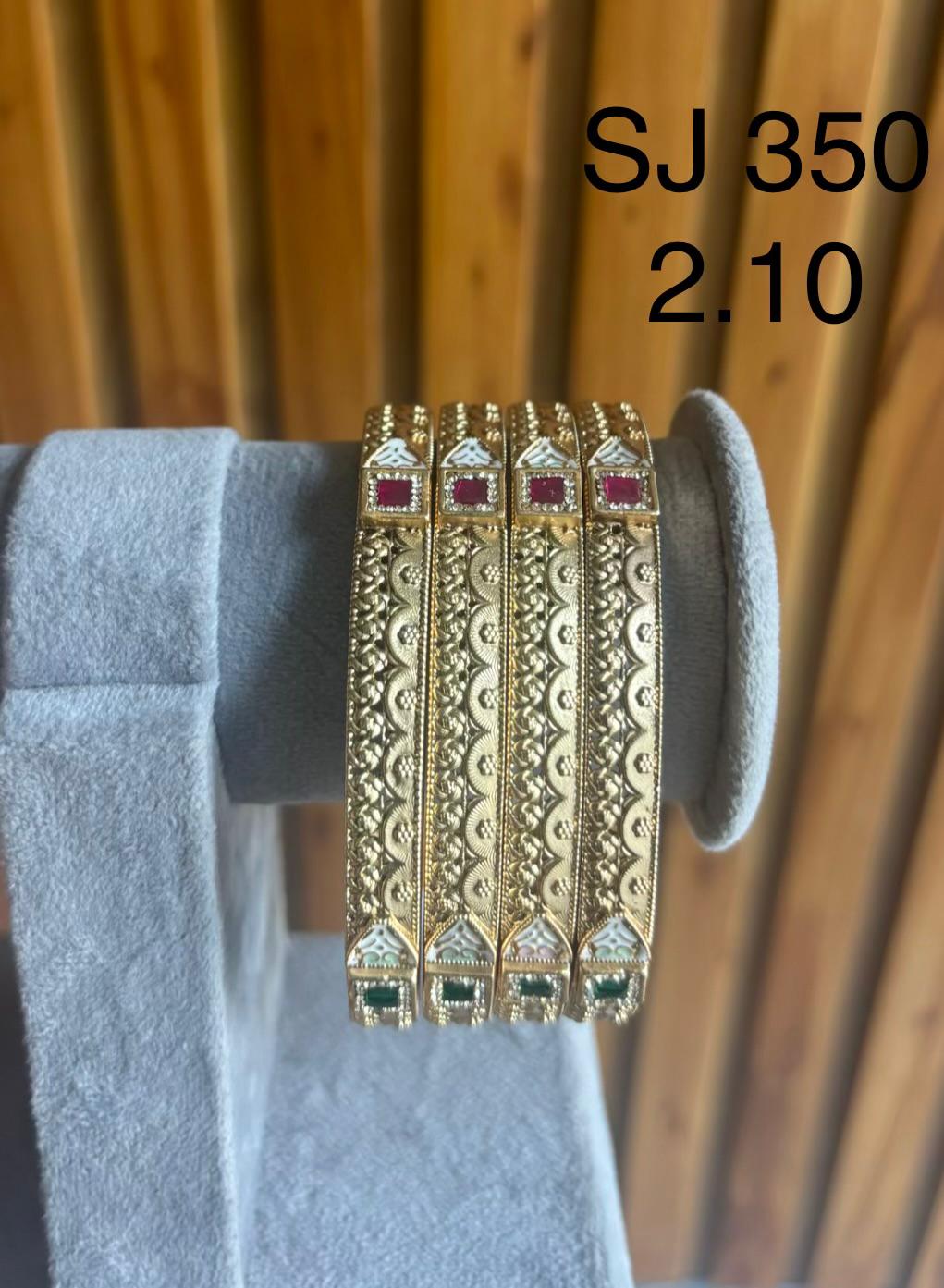 Antique Red Accent Filigree Bangles — original product photograph