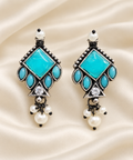 Blue Geometric Drop Earrings — AI-styled studio view; compare with original photograph