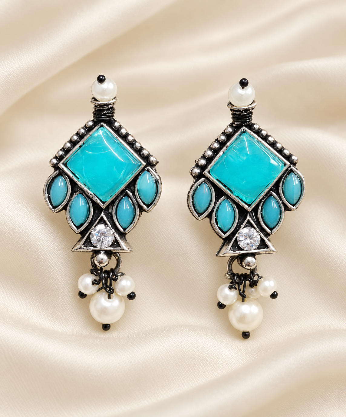 Blue Geometric Drop Earrings — AI-styled studio view; compare with original photograph