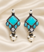 Blue Geometric Drop Earrings — AI-styled studio view; compare with original photograph