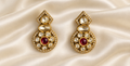 Fusion Red Accent Peacock Stud Earrings — AI-styled studio view; compare with original photograph