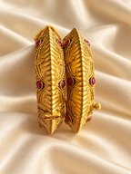 Kundan Sculpted Leaf Red Accent Bangle Set — AI-styled studio view; illustrative, compare original product photograph