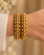 Kundan Raised Bead Bangle Set — AI-styled wearing view; illustrative scale, compare original photograph