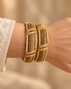 Kundan Fine Lattice Bar Bangle Set — AI-styled wearing view; illustrative scale, compare original photograph